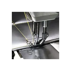 Machine à coudre pour les textiles techniques.