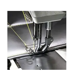 Machine à coudre pour les textiles techniques. Machine à coudre pour les textiles techniques.